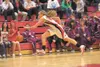 Wasilla returning junior Alysha Devine scrambles after the ball
during the Warriors game against the Juneau-Douglas Crimson Bears
during the 2011 Doc Larson’s Roundball Classic at Wasilla Hig