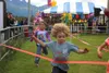 Games like the Diaper Derby, Toddler Trot, and three-legged race pitted children against each other as they competed for for prizes and ribbons at the Alaska State Fair Kids Day Friday. JACOB