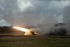 U.S. Marines with 3d Battalion, 12th Marines, 3d Marine Division, fire rockets from an M142 High Mobility Artillery Rocket System during exercise Resolute Dragon 22 at Yausubetsu Maneuver Are