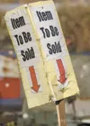 A sign alerts auction goers to current items being bid on at
Saturday's auction. (ROBERT DEBERRY/Frontiersman) Robert DeBerry