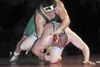 ROBERT DeBERRY/Frontiersman Colony heavyweight Ty Farber pushes
Wasilla’s Ryan Pomrenke to the mat during Saturday’s North-South
Invitational finals at Wasilla High School. Robert DeBerry