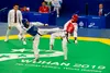 Army Pvt. 2nd Class Juancarlos Norzagaray-Garcia with the U.S. Armed Forces Taekwondo Team fights against an Iranian competitor at the Council of International Sports for Military games (CISM
