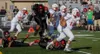 Wasilla Gavin Harrington works to elude Houston's Kiderro Fono during a win over the Hawks. Courtesy of Brian Boyett