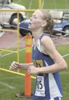 MATT TUNSETH/Frontiersman Susitna Valley’s Missy Scott crosses
the finish line during the girls 1-2-3A race at the Palmer
Invitational Saturday. Scott finished 17th overall. For complete
meet
