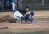 Colony catcher Morgan McJimsey makes the tag as Kodiak’s Blake James is gunned down at home plate during the fourth inning of Colony’s 9-1 win over the Bears in the Southcentral Conference Ch