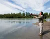 Mike Gibson casts into the Knik River while fishing at Eklutna Tailrace Thursday afternoon. ROBERT DeBERRY/Frontiersman.com