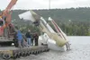 A Cessna 206 floatplane is lifted out of Beluga Lake in Homer after crashing July 10, killing MEA Human Resources and Public Affairs director Cheryll Heinze. SEAN PEARSON/Homer Tribune