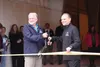 Eddie Ezelle (left) with the Mat-Su Food Bank and Terry Smith, president of Unified Operations LLC of Anchorage, cut the ribbon on a joint Food Bank/United Operations facility. HEATHER RESZ/F