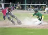 Chugiak Chinooks catcher Adam Humes scrambles for the ball as Mat-Su Miners outfielder Bobby Boyd slides across home plate during Monday's game at Hermon Brothers Field in Palmer. ROBERT DeBE