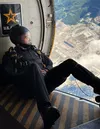 SSG Daniel Gerlach takes a moment to take in the Alaskan skies and the breath- taking views afforded at this altitude minutes before he and others on the team would jump and put on a show for