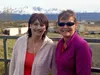 Wasilla resident Dana Doty, left, smiles for a photo with friend Patricia Burroughs at the Mat-Su Experiment Farm in Palmer on Thursday, April 21. Burroughs has signed up to run the 15.75-mil