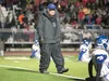 Palmer coach John Switzer looks over the Palmer Moose before the start of the second half of the 35th annual Potato Bowl at Veterans Memorial Field in Wasilla Friday. Switzer began his Valley