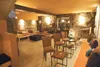 ROBERT DeBERRY/Frontiersman A converted basement reminiscent of
a Napa Valley wine cellar has a warm and inviting feel.