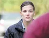ROBERT DeBERRY/Frontiersman Alaska State Troopers spokeswoman
Megan Peters answers questions from reporters Friday near where the
body of missing Anchorage nurse Mindy Schloss' was discovered
