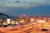 Rush-hour traffic moves at a steady pace along the Parks Highway in Wasilla. The state Department of Transportation is planning a four-lane highway from Lucus Road to Big Lake Road with a cen