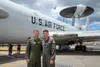 U.S. Air Force Col. Dominic Setka, former 5th Air Force chief of staff, left, and U.S Air Force Capt. Nathan Setka, 961st Airborne Air Control Squadron air weapons officer, pose for a photo i