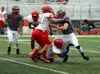 Wasilla quarterback Colton Lindquist fights through a tackle during a win over West Valley. Wasilla was set to host North Pole Friday, but that game has been moved to North Pole. The Mat-Su B