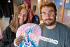 Snowboard company owners Cari and Kevin Molinaro stand inside their Northstar Snowboards booth at the 2013 Alaska State Fair Saturday afternoon. The Knik area-based husband-and-wife duo start