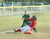 ROBERT DeBERRY/Frontiersman Colony third baseman Lindsey
Harrelson tags out a sliding Juneau-Douglas Crimson Bear during
Thursday's game at Bumpus Ball Fields in Wasilla.