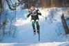 Colony cross-country skier Eli Morris catches a little air as he
competes in Friday’s race at Colony High School. ROBERT DeBERRY/Frontiersman
