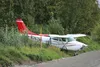 A small plane crashed into a fence along the Palmer-Wasilla Highway Tuesday. Tim Rockey/Frontiersman