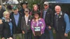 Alaska Gov. Bill Walker and his wife Donna, left, stand with the Plagerman family of Delta Junction, the recipients of this year's Alaska Family Farm of the Year award at Thursday's State Fai