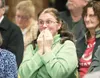 ROBERT DeBERRY/Frontiersman Marci Schmidt holds her excitement
as the Wasilla City Council votes on the purchase of Meta Rose
Square Monday at Wasilla City Hall.