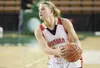 ROBERT DeBERRY/Frontiersman Wasilla senior Jenna Johnson looks
for an open teammate during the Warriors’ game against Dimond on
Friday.
