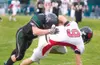 ROBERT DeBERRY/Frontiersman Colony senior Dakota Wainwright
tackles Juneau-Douglas’ Colin Gozelski during the Knights’ 26-7 win
over the Bears. Colony is now ranked fifth according to the ASB