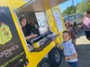 A local food truck offers meals during a test run for the new Palmer Towne Food Court marketplace opening in downtown Palmer. Courtesy photo