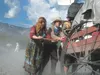 A dust cloud rises behind a group muscling one of 25 handcarts up a hill during the 2013 Pioneer Trek, a four-day, 30-mile trip through the Knik River Public Use Area June 10-14. Courtesy Bar
