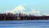 Denali looms over the frozen surface of Big Lake on Wednesday, Jan. 6, 2016. A Japanese climber died on the West Buttress route Tuesday, June 14. MATT TUNSETH/Frontiersman.com