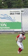 Wasilla Road Warriors right fielder Sam Reed prepares to haul in a fly from Mose Hayes of the Twins in the fourth inning of the first game of a doubleheader at Coral Seymour Memorial Park in 