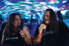 Sandra Peschang and Steve Foster sing ‘Take Your Time’ by Sam Hunt in Johnnie’s karaoke cab outside Tailgaters Sports Bar and Grill in Wasilla at about 10 p.m. Friday night. CAITLIN SKVORK/Fr