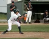 Brian Ferry, a 2003 graduate of Palmer High School, lays down a
bunt during the Mat-Su Miners' 6-5 loss to Stockton on Wednesday.
Ferry made the squad in an open tryout on Tuesday. JEREMIAH B
