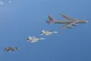 Royal Australian Air Force aircraft No.6 Squadron (SQN) EA-18G Growler, a No.1 SQN F/A-18F Super Hornet and from No.3 SQN, a F-35A Lightning aircraft, fly alongside a United States Air Force 