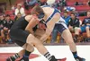 Wasilla's Justin Gentz grapples with Palmer's Jesse Sanders Friday at Wasilla High School during the Wasilla High School Duals. ROBERT DeBERRY/Frontiersman.com