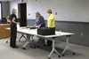 City of Wasilla staff count absentee ballots Friday. Tim Rockey/Frontiersman