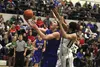 Palmer senior Michael Kluting lifts the ball to the rim during Palmer's 64-56 win over Colony in the Northern Lights Conference semifinals March 11, 2016, at Palmer High School. JEREMIAH BART