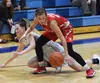 Wasilla's Karlie Anderson chases after a loose ball in front of Soldotna's Aliann Schmidt Friday night in a conference meeting at Soldotna High School. Joey Klecka/Peninsula Clarion