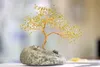 A banzai tree sculpted from wire and beads by artist Mary Boyd.
(ROBERT DeBERRY/Frontiersman)