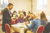 Rabbi Mendy Greenberg speaks with guests during the 2024 Passover celebration. Courtesy photo