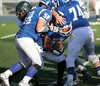 Palmer running back Jeff Glynn tries to squeeze between a pair of players during a 24-0 loss to Colony Aug. 28 at Palmer High School. Courtesy of Bruce Eggleston/matsusports.net