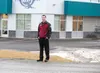 Andy Faiks, part owner of Western Enterprises, stands near the entrance of City Center Wasilla along Knik-Goosebay Road. A $1.1 million loan channeled through the Alaska Industrial Developmen