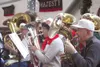 Tuba Christmas performs for a crowded Curtis D. Menard Memorial
Sports Center at Sunday's 20th annual Christmas Friendship Dinner.
Organizers estimate a record 2,850 people enjoyed the holida