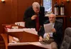 House Majority Leader Dan Saddler, R-Eagle River, leans over to examine a proposed budget amendment with House Rules Chair Craig Johnson, R-Anchorage, on Tuesday, April 4, 2023, in the Alaska