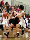 Houston's Cole Taylor brings the ball down the court during a win over Sitka Bruce Eggleston/matsusports.net