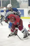Wasilla senior forward Dylan McRee blocks Palmer’s Miles George
on a faceoff during the third period of Wasilla’s 6-2 win over
Palmer Friday night at the MTA Events Center in Palmer. ROBERT D
