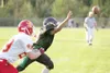 ROBERT DeBERRY/Frontiersman Colony defensive back Matt Swan
stretches to the ball, trying to intercept a West Valley pass
during the first quarter of a 40-7 rout of the Wolfpack on Friday
at 