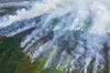 Smoke rises from a tundra fire burning on June 13 near the Yukon-Kuskokwim Delta village of St. Mary's. This year's East Fork Fire and Apoon Pass Fire were the two biggest Yukon-Kuskokwim tun